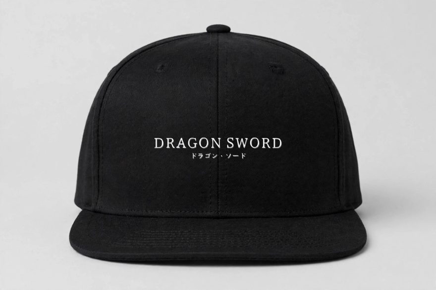 Dragon Sword black snapback with the white logo lockup on the front panel